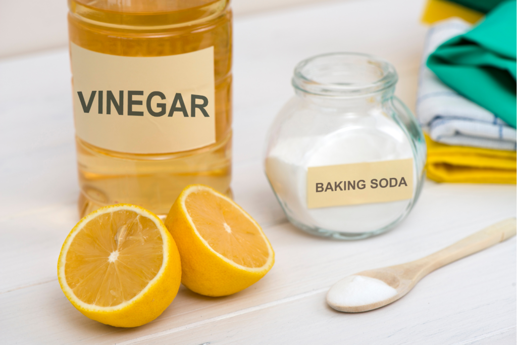 picture of all natural cleaning agents such as vinegar, lemon, and baking soda