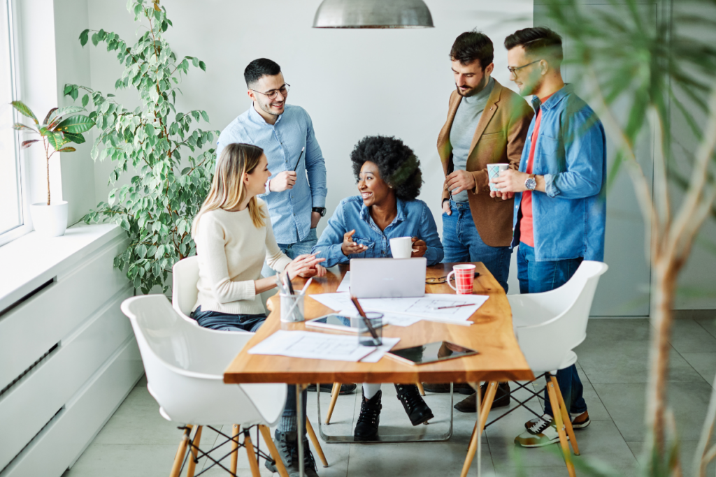 Happy business people discussing in an office