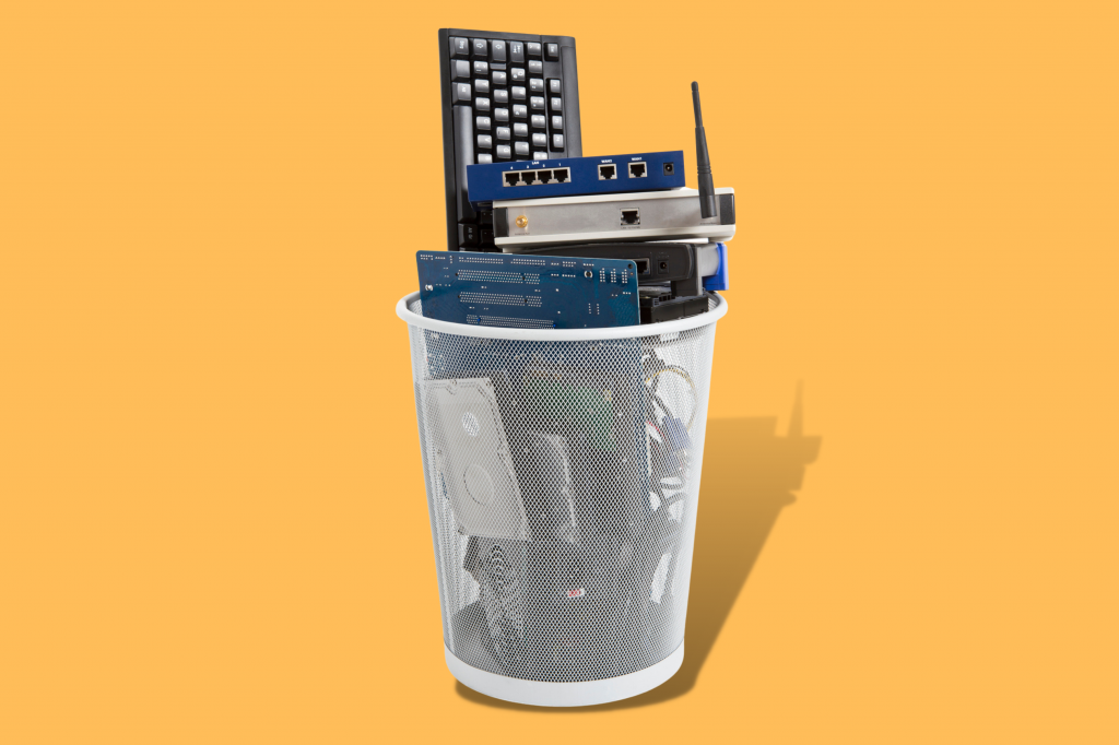 waste basket filled with electronic waste