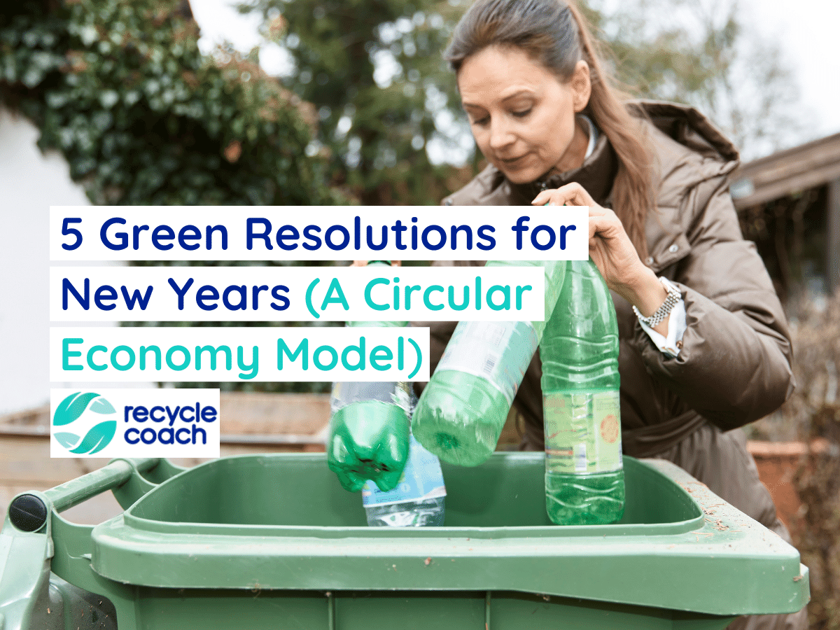 Woman throwing plastic bottles in a recycling bin