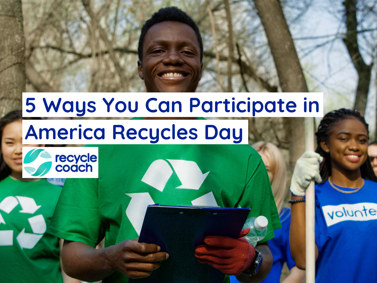 A group of people wearing recycling shirts getting ready to for a clean up day